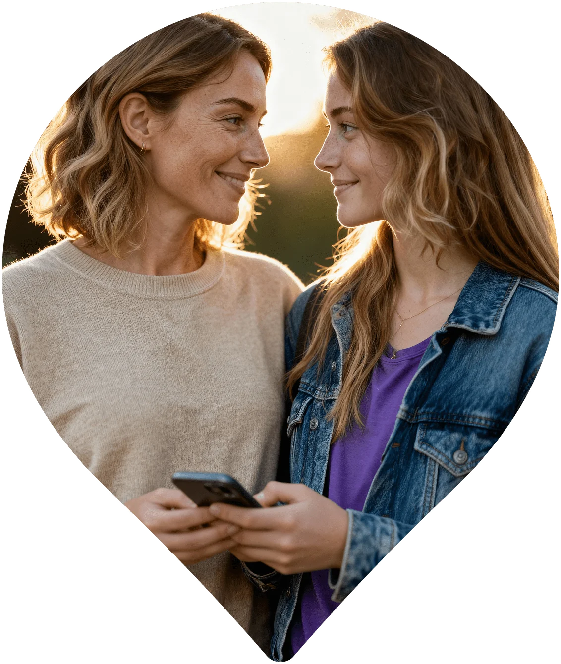 Mother and daughter smiling at each other